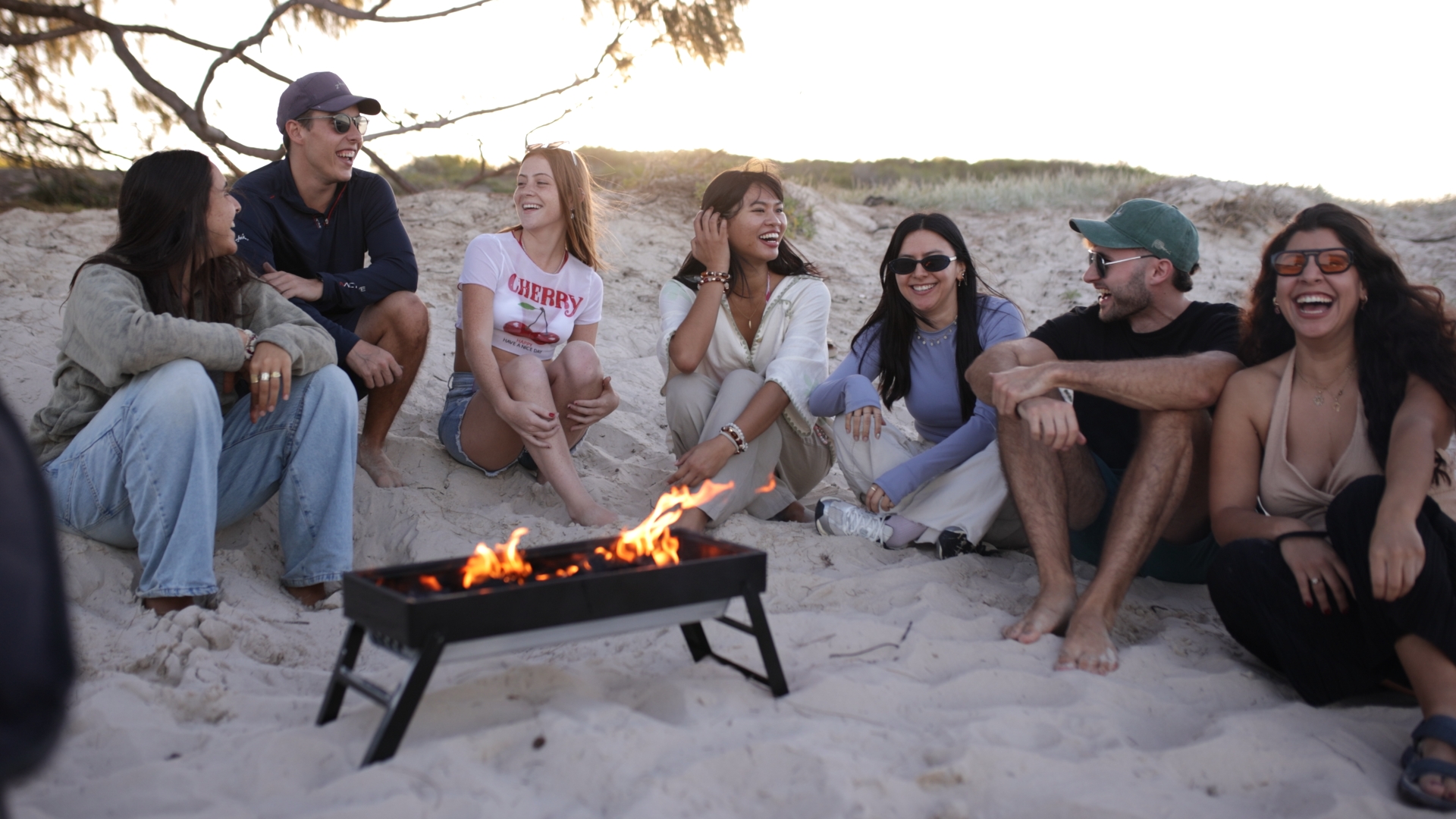 Friends relaxing together during a Campfire Crew island weekend